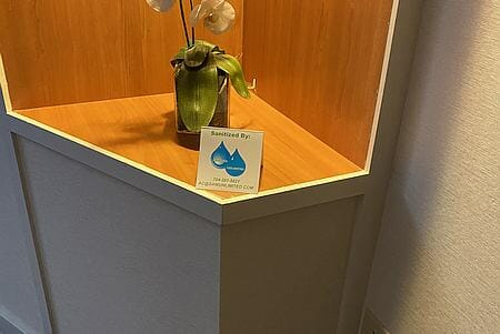 Sanitize Unlimited leaves a place card after sanitizing a hotel room.